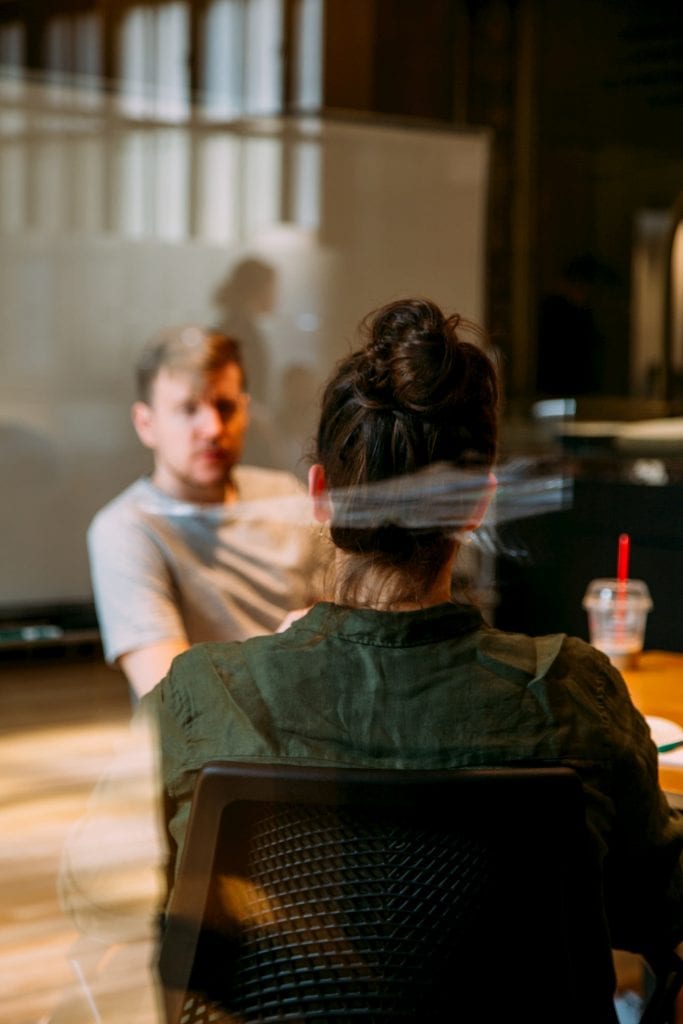 Man and woman in one-on-one meeting